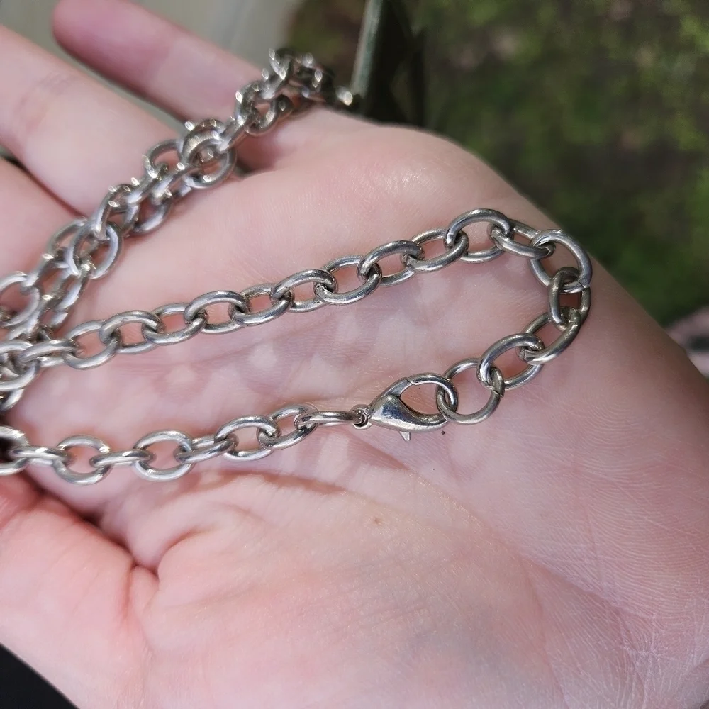 WWE brown and silver tone pendant necklace The Undertaker